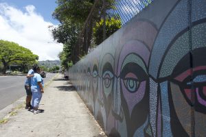 Admiring the colours of the finished mural