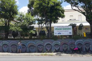 Putting some finishing touches to the mural, Honolulu Central Middle School